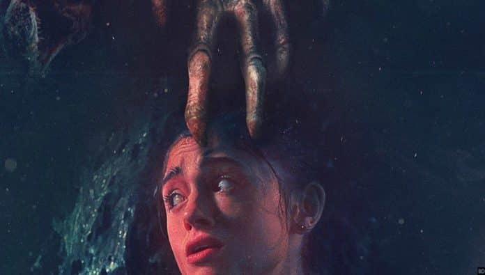 Nancy Wheeler minacciata dalla mano del Demogorgone nel nuovo poster di Stranger Things 2 Nancy Wheeler protagonista del nuovo poster di Stranger Things 2 ispirato a Nightmare