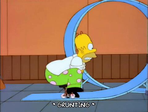 Homer su una mini-bici da clown Homer si aggroviglia grazie a una mini-bici da clown