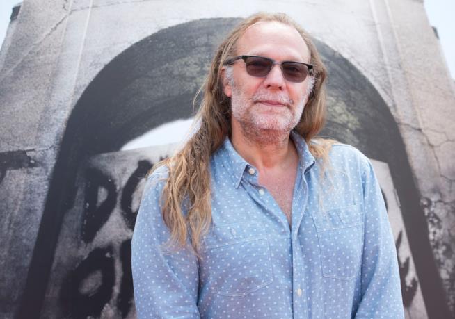 Grag Nicotero rivela che The Walking Dead 7 sarà l'inizio di una nuova era Greg Nicotero davanti all'attrazione di TWD agli Universal Studios
