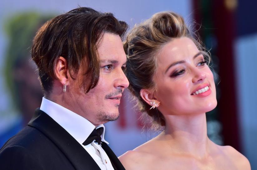 Amber Heard accusa Johnny Depp: 'Minacciò di uccidermi' Amber Heard e Johnny Depp quando erano una coppia