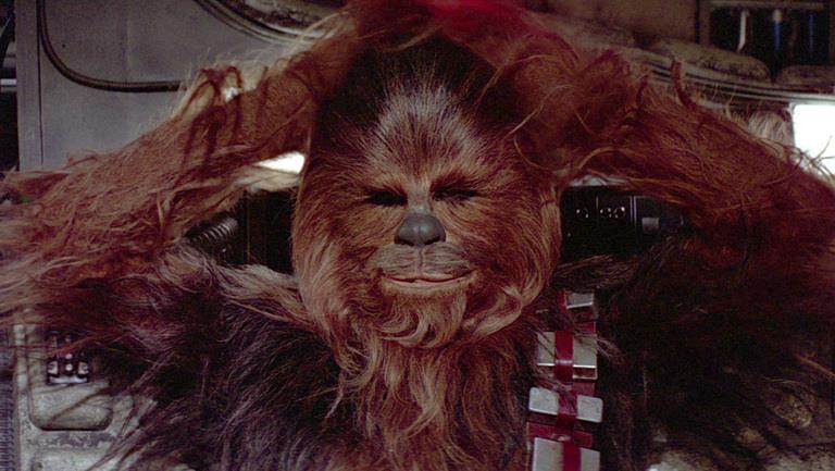 Chewbecca in una scena di Star Wars Chewbecca in un'immagine delal saga di Star Wars