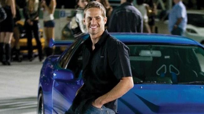 Il cast di Fast & Furious 8 omaggia Paul Walker Paul Walker sorridente nel film