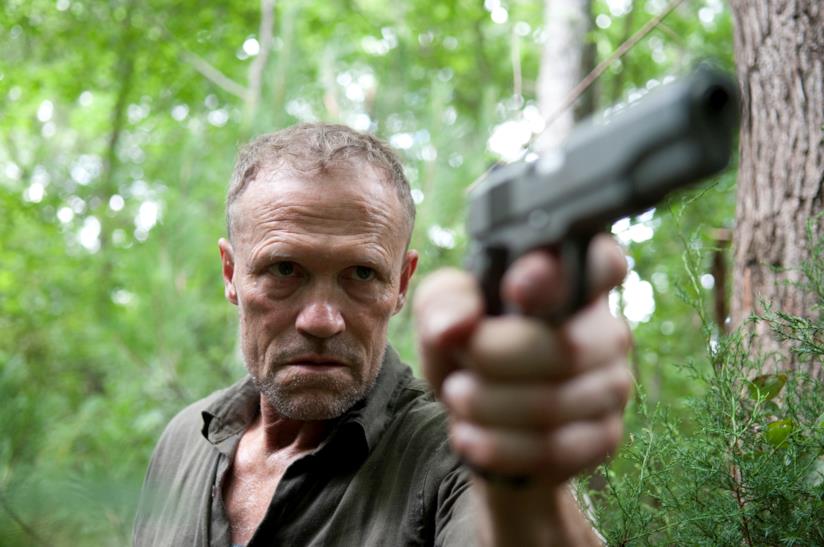 L'attore Michael Rooker, Merle Dixon in The Walking Dead, ha raccontato come finirà secondo lui la serie L'attore Michael Rooker nei panni di Merle Dixon in The Walking Dead