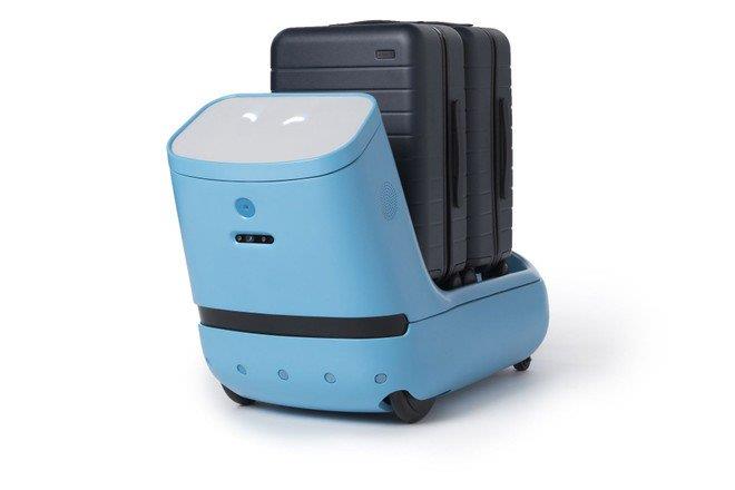 Care-E può trasportare bagagli fino a 38 kg Care-E impegnato a trasportare un trolley