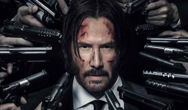 La lavorazione del terzo capitolo di John Wick viene confermata durante la presentazione del secondo capitolo della saga. John Wick circondato dalle pistole