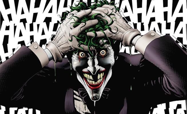 Il Joker: cosa devi sapere della nemesi di Batman, dai fumetti al cinema Mezzobusto del Joker con le mani tra i capelli sullo sfondo di una folle risata