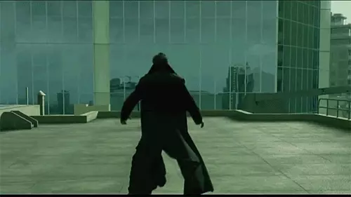 Bullet time in Matrix Gif di Neo che schiva le pallottole