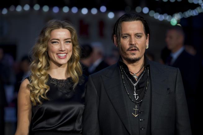 Amber Heard ha accusato Johnny Depp di averla picchiata Primo piano di Johnny Depp e Amber Heard