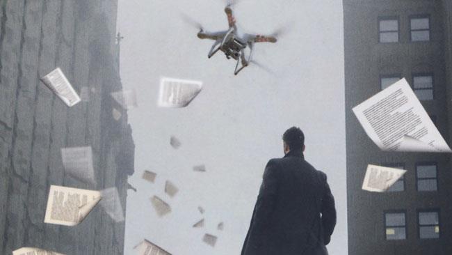 The Store di James Patterson Un uomo in mezzo a fogli volanti mentre guarda un drone