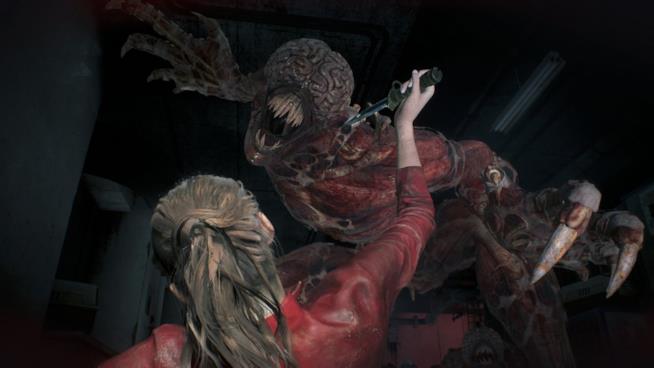 Resident Evil 2 Remake, il nuovo video gameplay mostra i famelici Licker Claire Redfield alle prese con un Licker in RE2 Remake