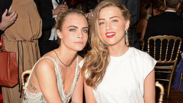 Amber Heard ha fatto infuriare Johnny Depp per colpa di Cara Delevingne Primo piano di Amber Heard e Cara Delevingne