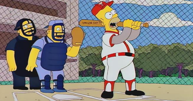 Un premio sportivo per Homer Simpson Homer Simpson mentre gioca a baseball