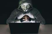 Il gruppo hacker Anonymous pensa che la Nasa sia vicino a rivelare l'esistenza di vita aliena Un hacker con la tipica maschera Anonymous