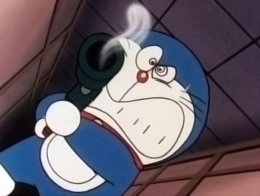Doraemon in modalità Terminator Doraemon impugna un'arma da fuoco