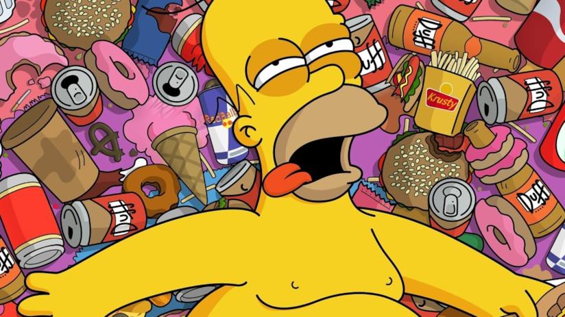 I Simpson: la fantastica scena del cibo del New Jersey ricreata da due turiste Homer Simpson in mezzo al cibo