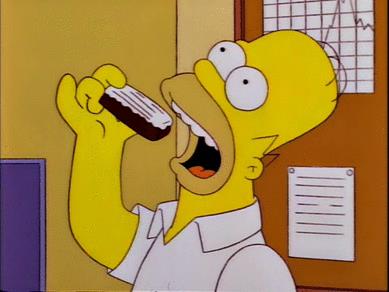 Homer mangia come un'anatra Homer s'ingozza come un'anatra per mangiare