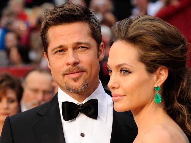 Brad Pitt va in rehab? Una vecchia foto di Brad Pitt e Angelina Jolie