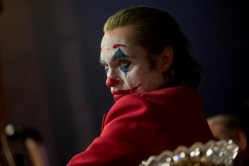L'esercito Usa è pronto a possibili sparatorie di massa alle proiezioni di Joker Un primo piano di Joaquin Phoenix in una scena del film Joker